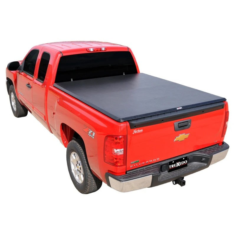 TruXedo TruXport soft roll-up tonneau cover in black leather-grain vinyl on a 2007-2013 Chevrolet Silverado 1500.