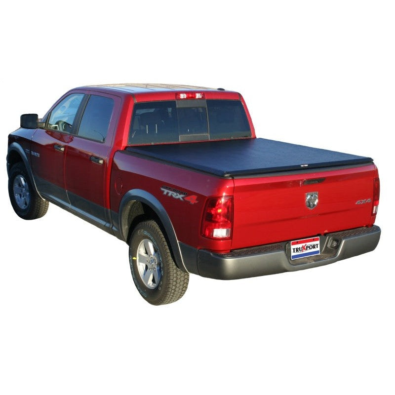 TruXedo TruXport soft roll-up tonneau cover in leather-grain vinyl on a Ram 1500 truck bed.