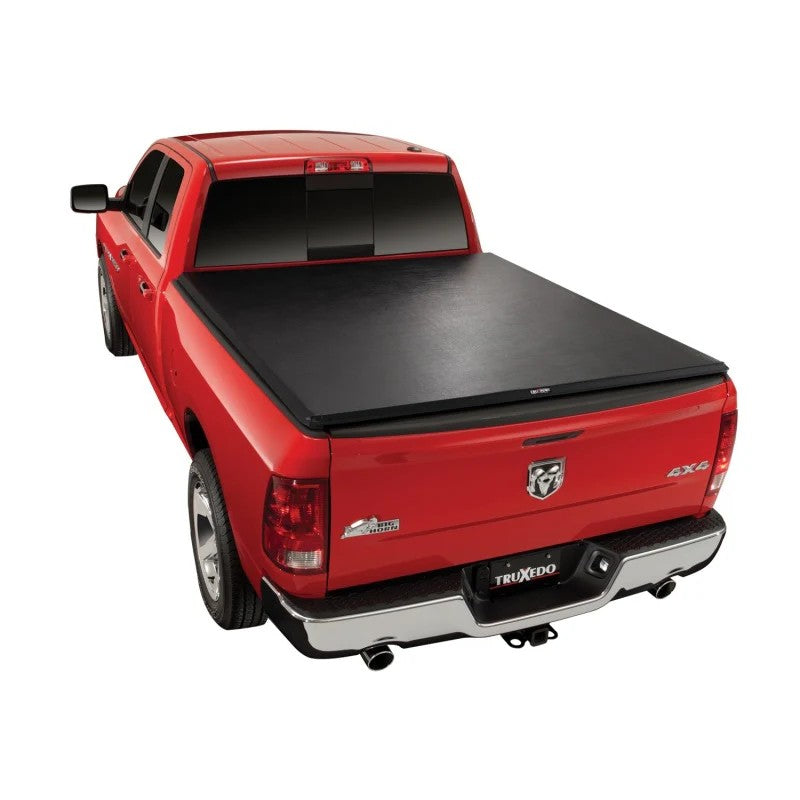 TruXedo TruXport soft roll-up tonneau cover installed and closed on a Dodge Ram pickup truck bed.
