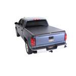 TruXedo TruXport soft roll-up tonneau cover in black leather-grain vinyl on a 2014-2018 Chevrolet Silverado 1500.
