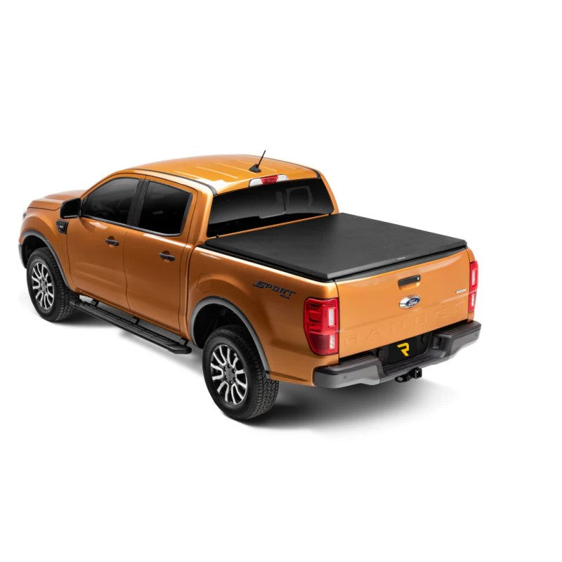 Truxedo TruXport soft roll-up tonneau cover on a Ford Ranger 5ft bed featuring black leather-grain RTxVinyl.