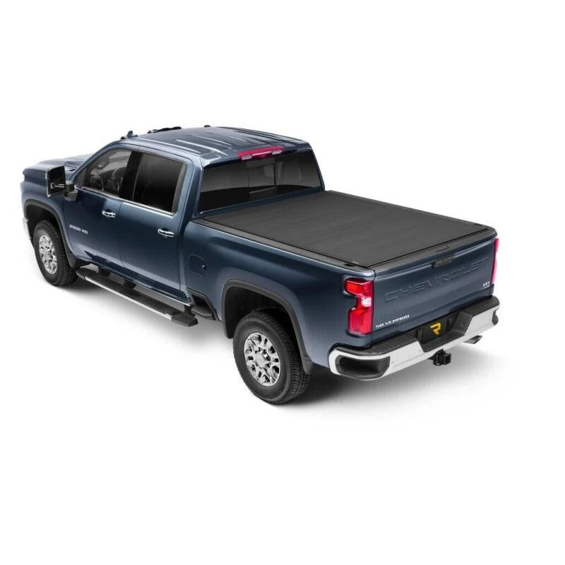 TruXedo Sentry CT matte black hard roll-up bed cover installed on a GMC Sierra 2500 HD truck bed