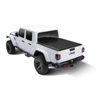 TruXedo Lo Pro low-profile roll-up truck bed cover in black leather-grain vinyl on a Jeep Gladiator 5ft bed.