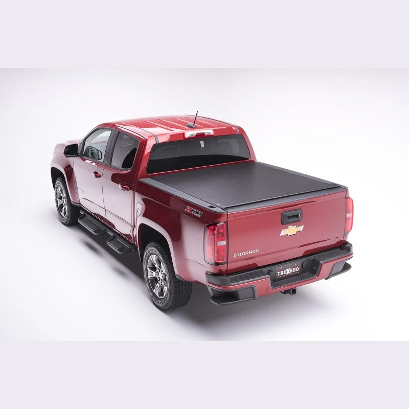 TruXedo Lo Pro roll-up truck bed cover in black leather-grain vinyl installed on a 2023-2026 Chevrolet Colorado.