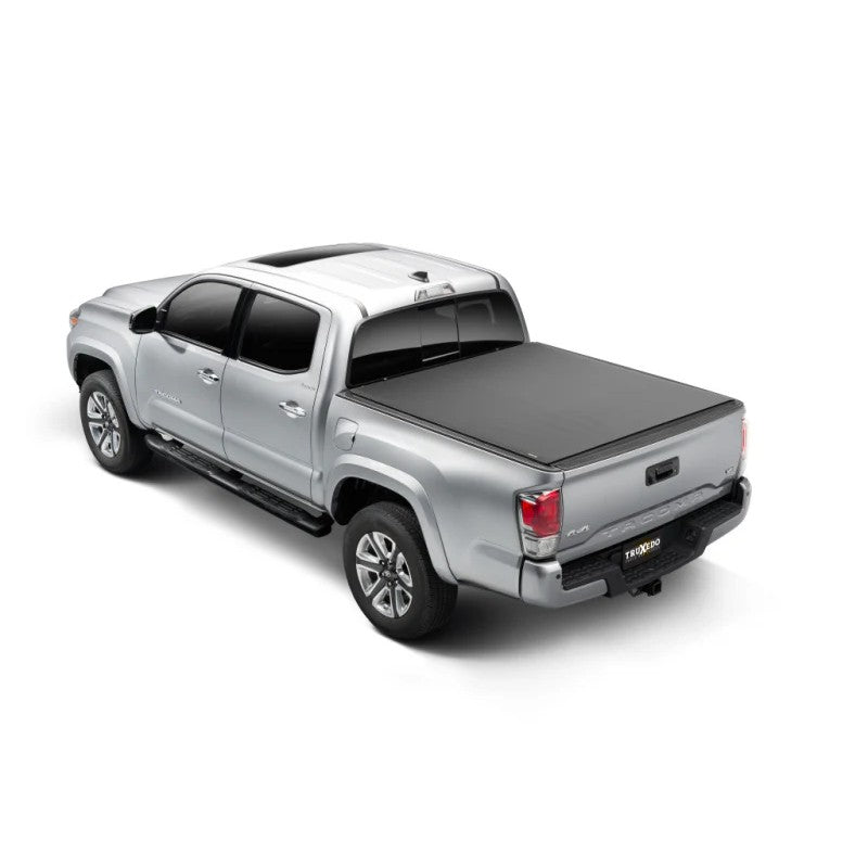 TruXedo Pro X15 matte black low-profile soft roll-up tonneau cover on a 2024-2026 Toyota Tacoma with a 5ft bed.
