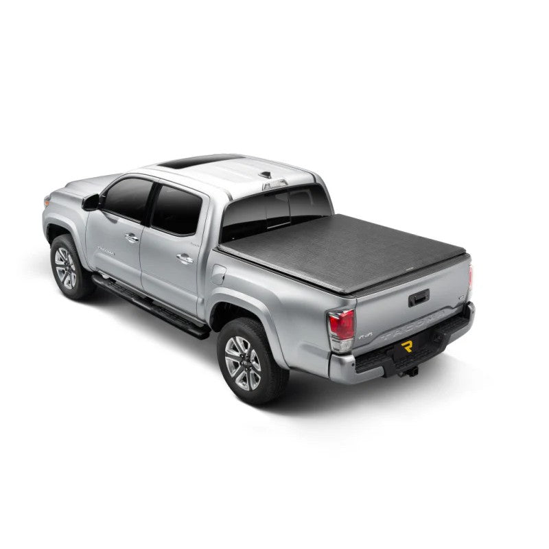 TruXedo TruXport black roll-up tonneau cover on a 2024-2026 Toyota Tacoma 5-foot bed.