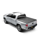 TruXedo TruXport 257101 roll-up tonneau cover installed on a 2024-2026 Toyota Tacoma with a 6ft bed.