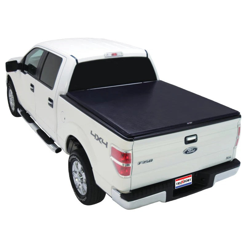 Black TruXedo TruXport soft roll-up tonneau cover on an 8-foot Ford truck bed featuring gloss RTxVinyl.
