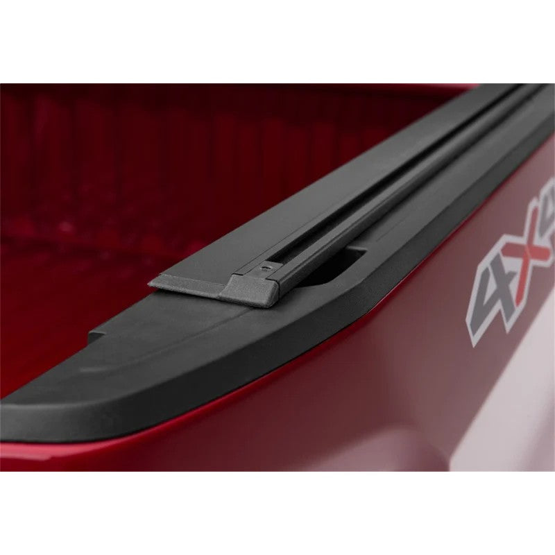 Black textured powder-coated 56-inch Truxedo Elevate TS Rails featuring integrated T-slot mounting channels.