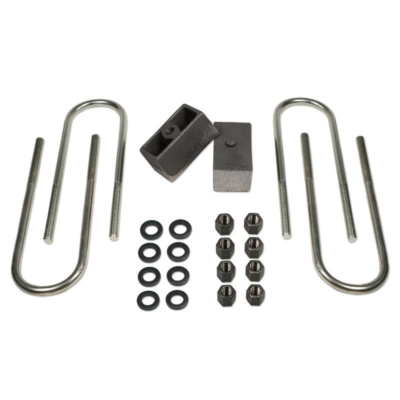 Tuff Country cast iron 2-inch rear lift blocks with zinc-plated extended U-bolts and mounting hardware.
