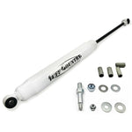 White Tuff Country EZ-Ride SX6000 rear hydraulic shock absorber with red polyurethane bushings.