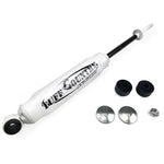 Tuff Country SX6000 front cellular gas shock absorber with white body and black polyurethane bushings.