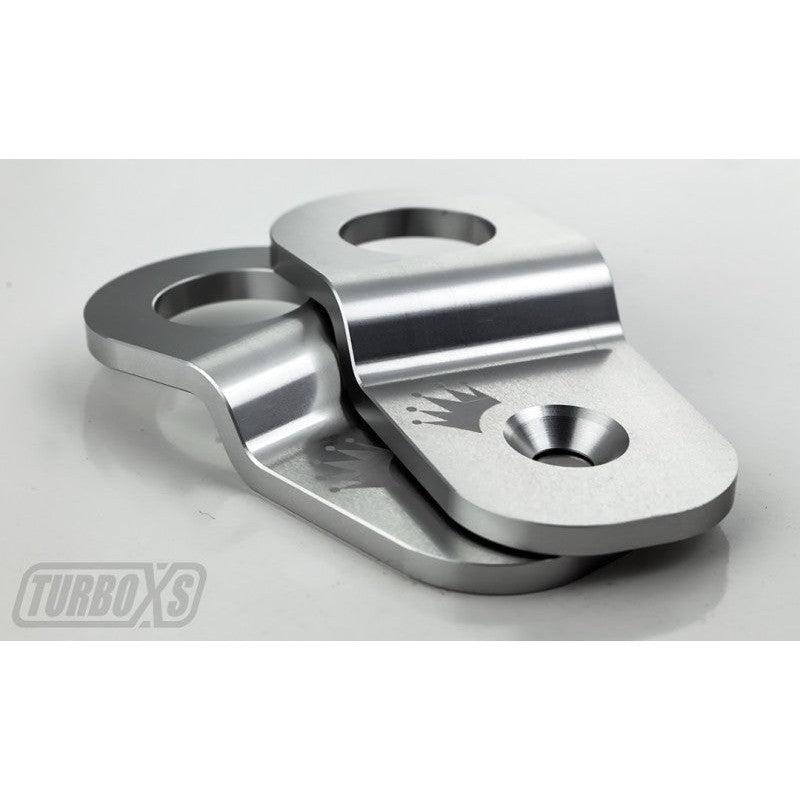 Turbo XS silver CNC-machined billet aluminum radiator stay for 2015-2016 Subaru WRX and WRX STI.