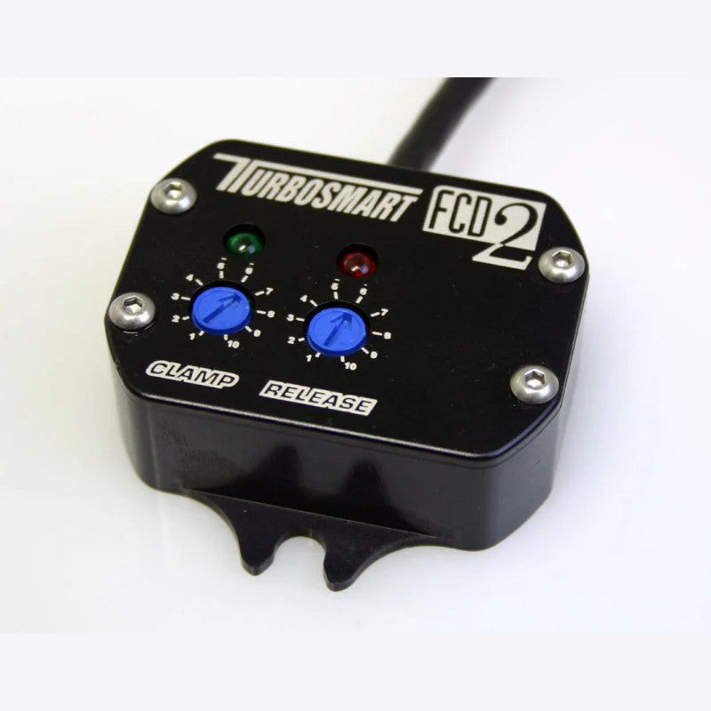 Turbosmart FCD-2 electronic fuel cut defender module with wiring harness and adjustment dial.
