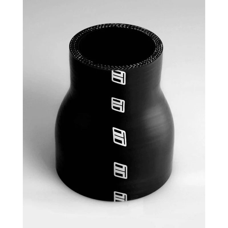 Black Turbosmart reinforced silicone hose reducer transitioning from 2.25-inch to 2.75-inch diameter.