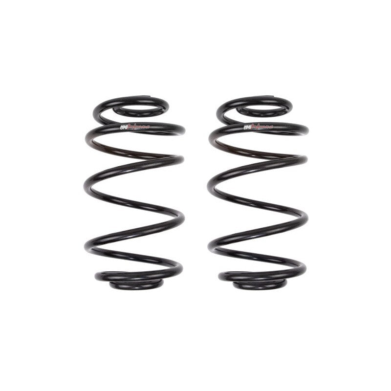 UMI Performance 4050R rear lowering springs with black powder coat finish for GM A-Body and G-Body vehicles.