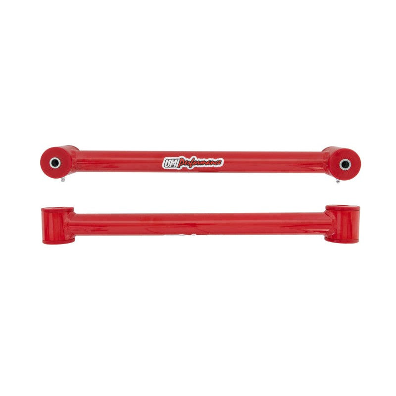 Pair of red tubular steel rear lower control arms with polyurethane bushings for 1982-2002 Chevrolet Camaro and Pontiac Firebird.