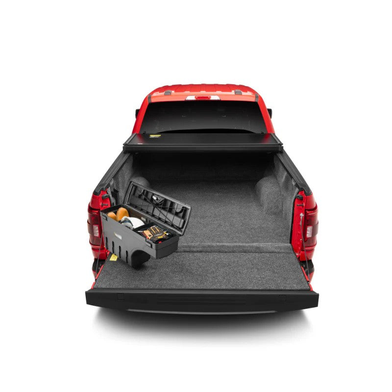Black smooth UnderCover SwingCase driver side truck bed storage box for 2015-2026 Ford F-150