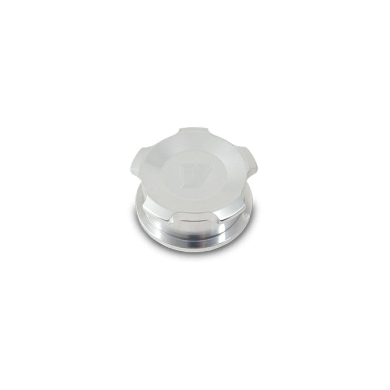 Vibrant Performance 1.5 inch OD 6061 aluminum weld-on tank bung with a matching polished aluminum threaded cap.
