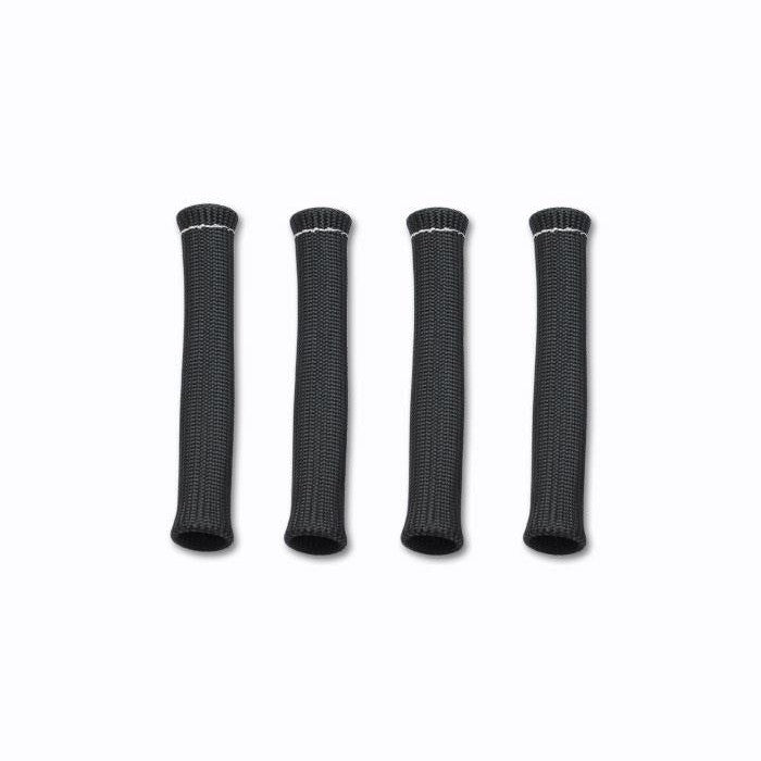 Four black braided fiberglass spark plug boot insulator sleeves for high-temperature thermal protection.