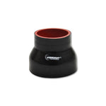 Black 4-ply aramid reinforced silicone transition hose coupler with 2 inch and 3 inch inside diameter openings.