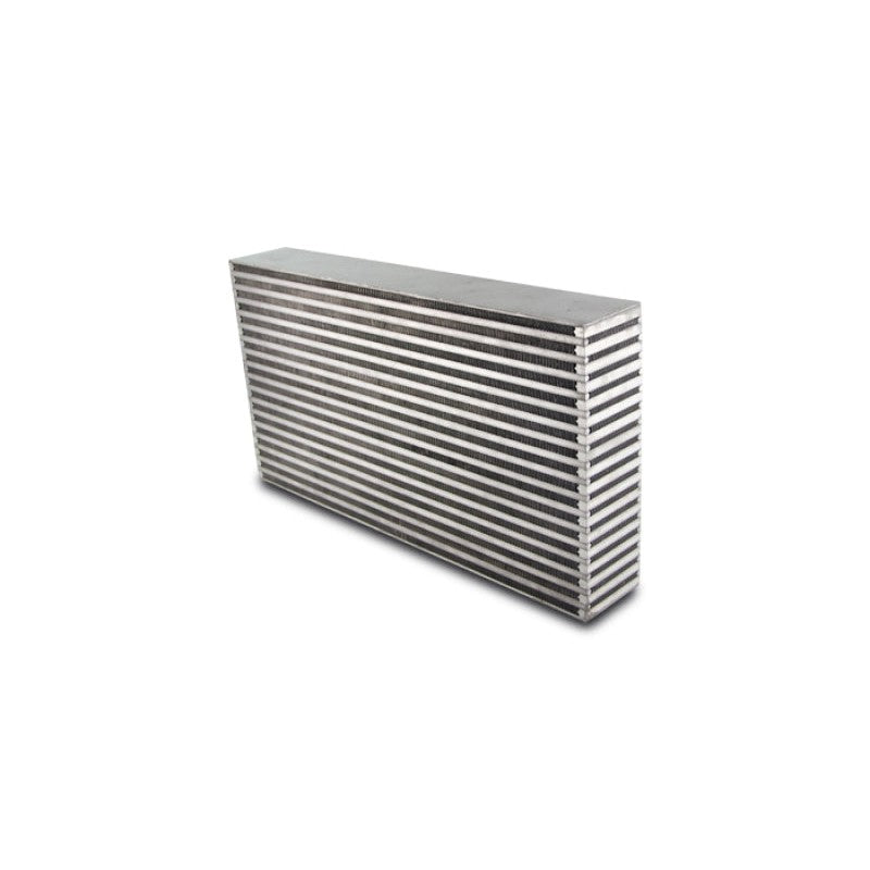 Silver bar and plate intercooler core with louvered cooling fins measuring 22 inches wide and 3.5 inches thick.