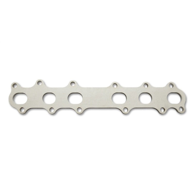 T304 stainless steel exhaust manifold flange with six precision-cut ports for Toyota 2JZ-GTE engines.
