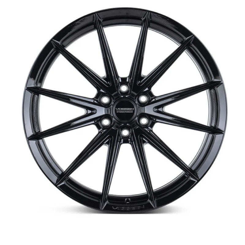Gloss black Vossen HFX-2 18x9 wheel featuring a multi-spoke design and Super Deep concave profile.