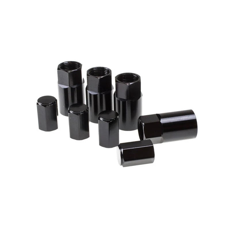 A single Wheel Mate TPMS valve stem cover in a black anodized aluminum finish.