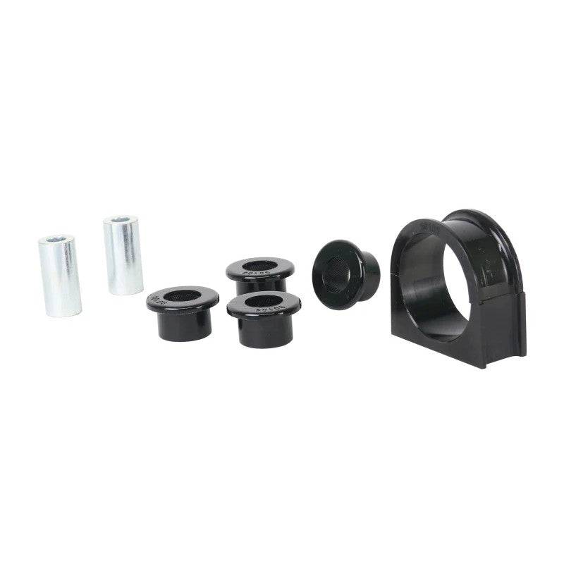 Whiteline W13389 steering rack mount bushing kit with five yellow synthetic elastomer bushings and grease packets.