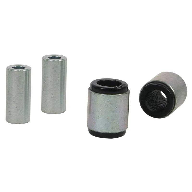 Whiteline W63597 synthetic elastomer rear lower control arm bushings with internal grease reservoirs.