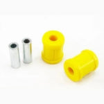 Whiteline W0594 synthetic elastomer rear trailing arm bushings with metal sleeves and molybdenum grease.