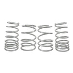 Set of four yellow Whiteline progressive rate performance lowering springs for 2004-2007 Subaru WRX STI.
