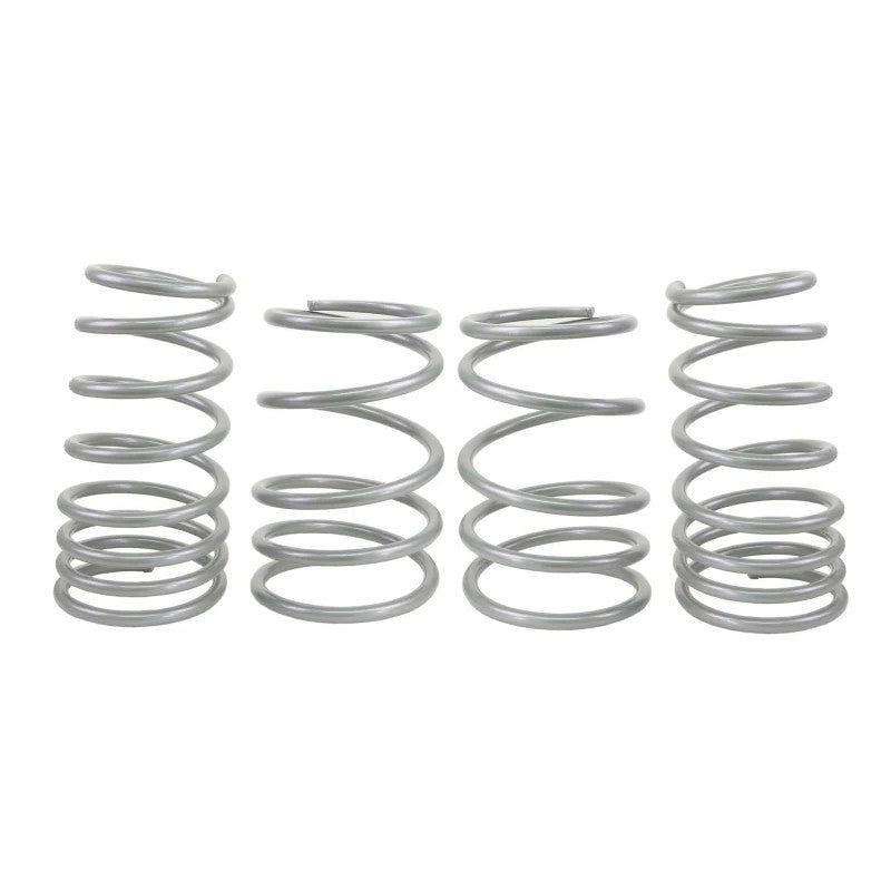 Set of four yellow Whiteline progressive rate performance lowering springs for 2004-2007 Subaru WRX STI.