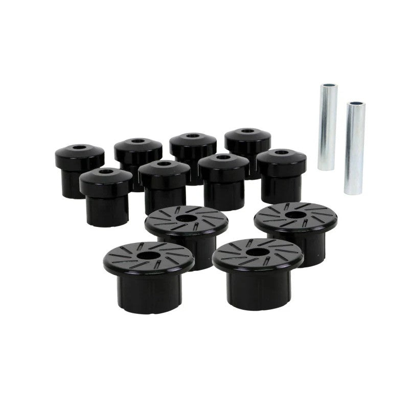Whiteline black synthetic elastomer rear leaf spring and shackle bushing kit W73835 for Toyota Tacoma.