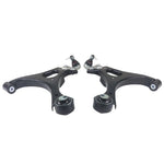Pair of silver Whiteline front lower control arms with pre-installed black synthetic elastomer bushings.