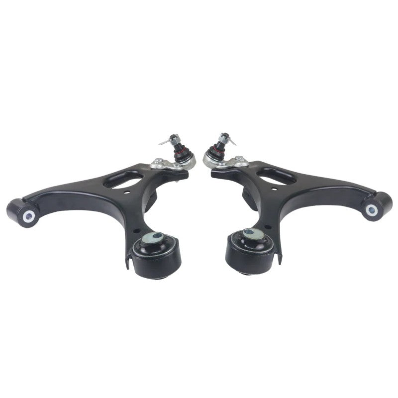Pair of silver Whiteline front lower control arms with pre-installed black synthetic elastomer bushings.