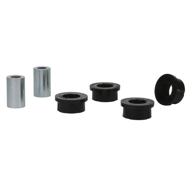 Whiteline W63583 synthetic elastomer rear toe arm inner bushings with metal sleeves and grease.