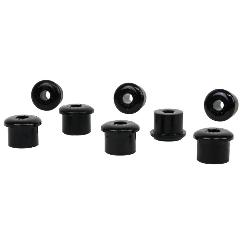 Black Whiteline synthetic elastomer rear spring eye and shackle bushings with 35mm outer diameter and 15mm inner diameter.