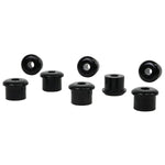 Black Whiteline synthetic elastomer rear spring eye and shackle bushings with 35mm outer diameter and 15mm inner diameter.