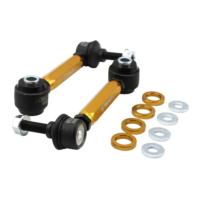 Whiteline KLC233 rear adjustable sway bar end links with silver threaded bodies and gold-tone ball joint hardware.