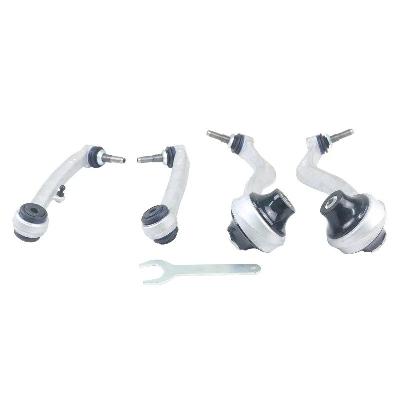 Whiteline KTA383 four-piece front lower control and radius arm kit featuring silver alloy arms and black bushings.