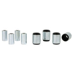 Whiteline synthetic elastomer rear trailing arm lower bushings with silver metal sleeves and molybdenum grease packet.