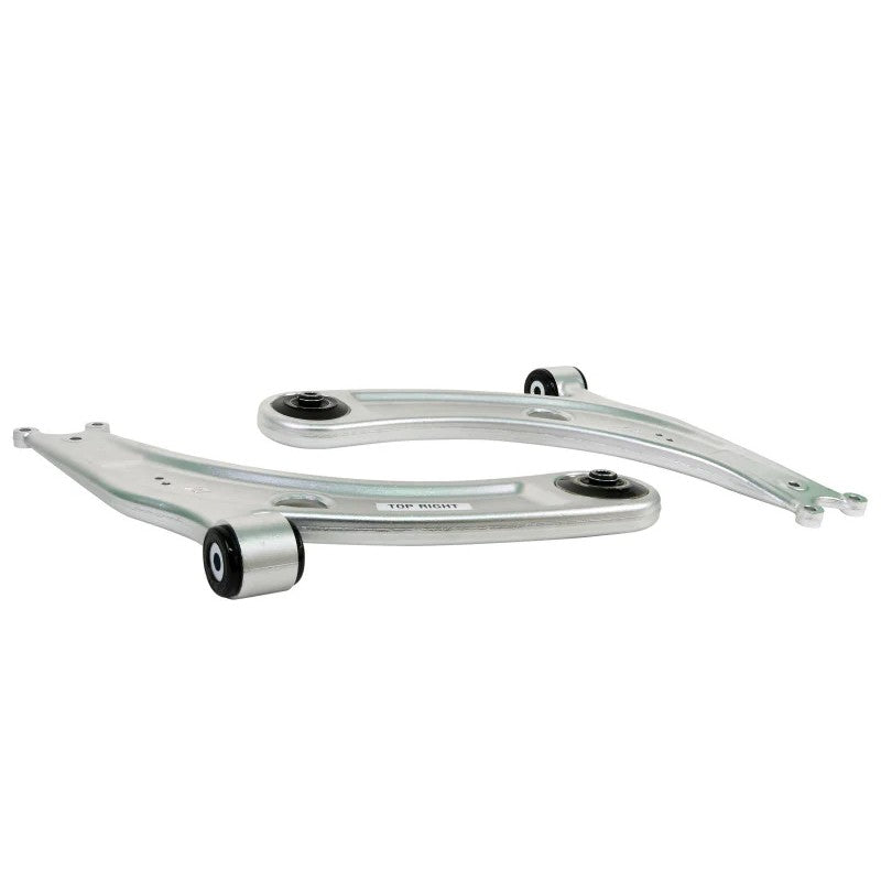 Pair of Whiteline front lower control arms with black synthetic elastomer bushings and molybdenum grease packets.