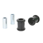 Whiteline W63612 rear trailing arm outer bushing kit featuring two yellow elastomer bushings and two metal sleeves.