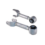 Pair of Whiteline KTA327 adjustable rear toe arms for Tesla Model 3 and Model Y featuring anodized alloy and silver finish.