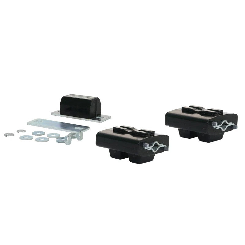 Whiteline W93571 engine and transmission mount bushing kit with yellow synthetic elastomer bushings and grease packets.