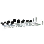 Whiteline W93497 body mount bushing set including 14 bushings, sleeves, washers, and installation hardware.