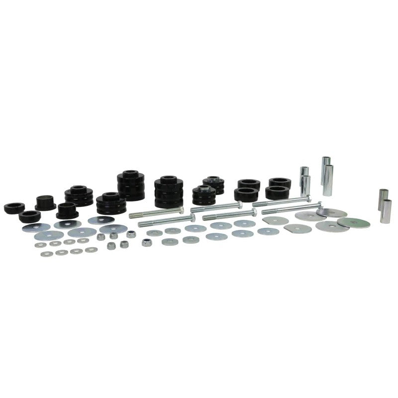 Whiteline W93497 body mount bushing set including 14 bushings, sleeves, washers, and installation hardware.