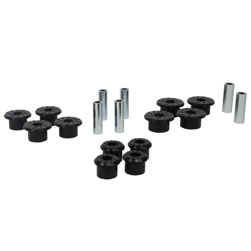 Whiteline W73821 black synthetic elastomer leaf spring eye and shackle bushing kit for Chevy and GMC trucks.